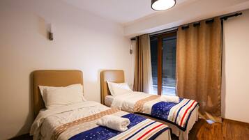 1 slaapkamer, een bureau, een strijkplank/strijkijzer, gratis wifi