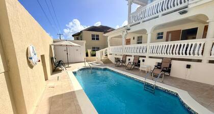 NEWLY REFURBISHED! Platinum Palace 2BR | Pool | 10 mins to Oistins Fish Fry