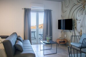 TV - House of Harmony Suites | Mira (Agia Pelagia)