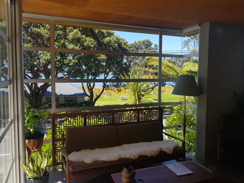 Worser Bay Beachfront Bach. Tranquil and peaceful with seaviews, garden and deck