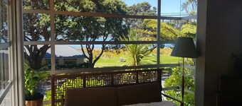 Worser Bay Beachfront Bach. Tranquil and peaceful with seaviews, garden and deck