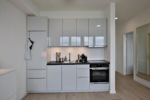 Private kitchen - Strandperle Ostsee Suite 4 - Your box seat by the sea in Niendorf (Timmendorfer Strand)