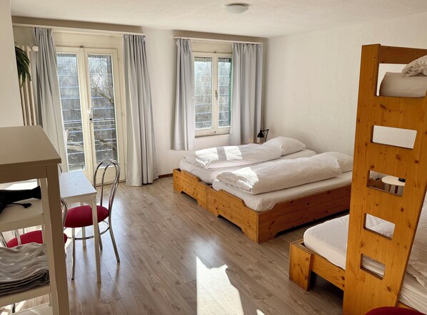 Family Apartment, 2 Bedrooms, Private Bathroom, City View | Blackout drapes, iron/ironing board, travel crib, free WiFi
