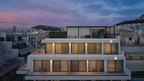 A modern multi-story building with balconies, large windows, and a flat roof. - September Athens Residences (Athens)