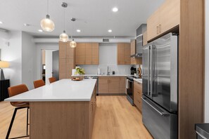 Fridge, microwave, oven, stovetop - Big Sky Town Center 2nd floor Luxury Condo (Big Sky)
