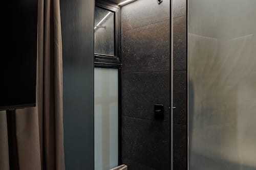 Superior Suite, 2 Bedrooms, City View | Bathroom | Shower, hair dryer, towels, soap
