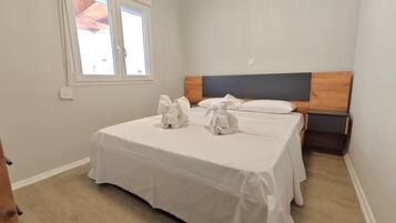 2 bedrooms, desk, iron/ironing board, travel cot