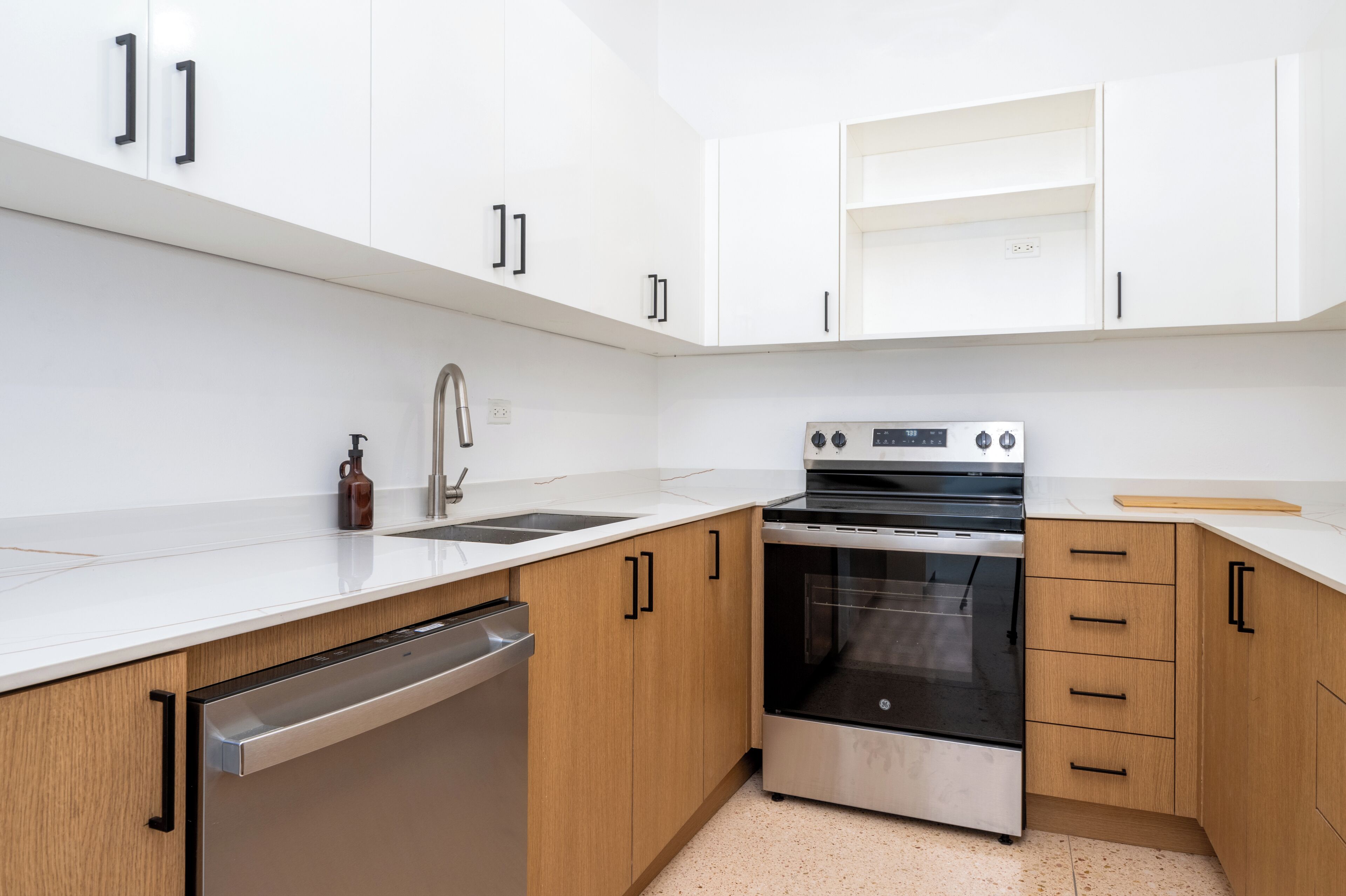 Full-sized fridge, microwave, stovetop, cookware/dishes/utensils