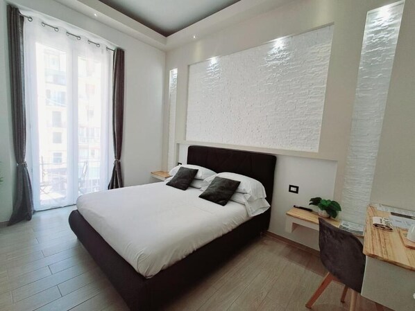 Double Room, Balcony, City View | Blackout drapes, soundproofing, iron/ironing board, free WiFi