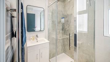 Shower, towels, shampoo