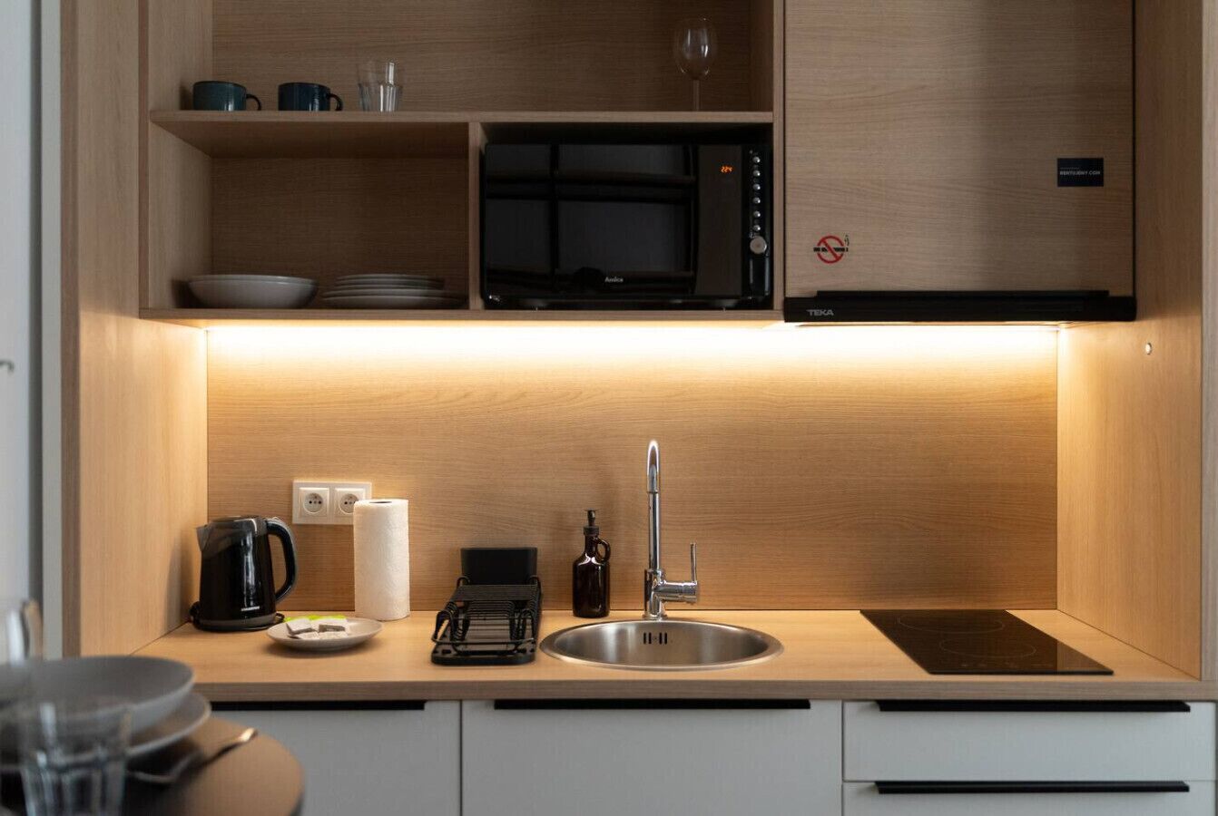 Fridge, microwave, stovetop, cookware/dishes/utensils
