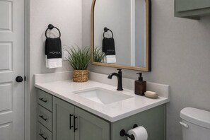 Shower, eco-friendly toiletries, hair dryer, towels