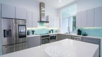 Habitación Confort | Cocina privada