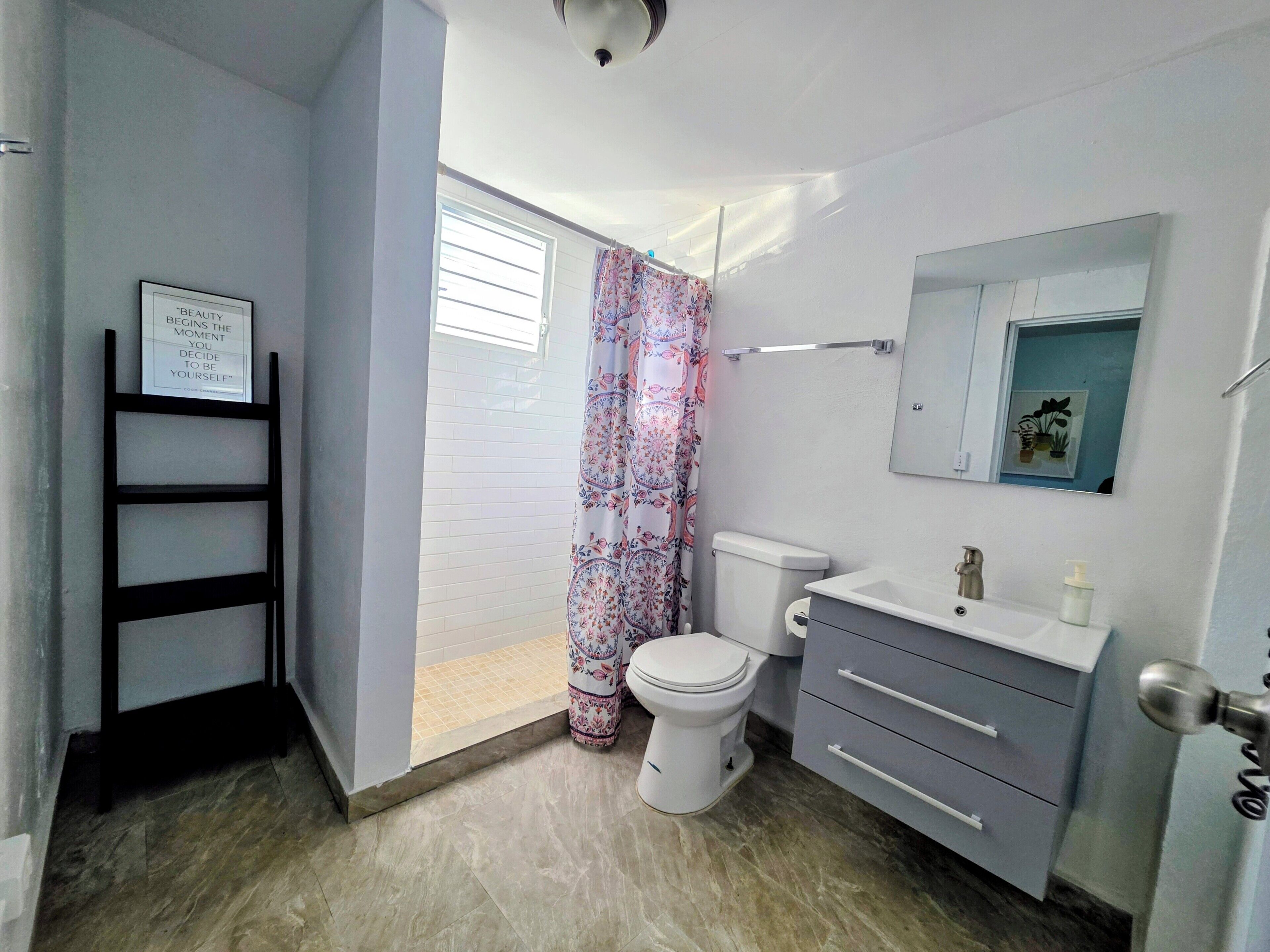 Shower, hair dryer, towels, toilet paper