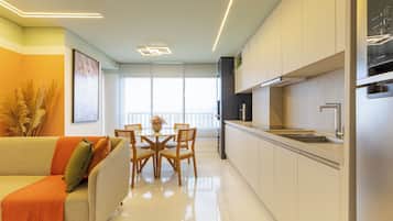 Comfort Apartment, Kitchen, Resort View | Living area | 40-inch Smart TV with digital channels, Netflix, streaming services