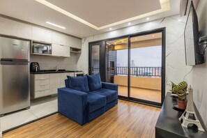 Familieleilighet, flere senger, eget bad, resort-utsikt | Oppholdsområde