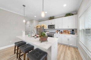 Fridge, microwave, oven, stovetop - Modern 3-BR Townhome—Just Steps to Downtown Waxhaw! (Waxhaw)
