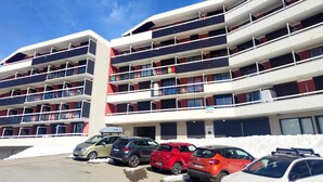 A multi-story parking garage with several cars parked. - Les Marmottes Ndeg112 - ST5 (Chamrousse)