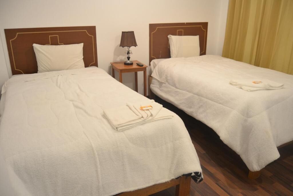 Habitación estándar con 2 camas individuales | Wifi gratis y ropa de cama