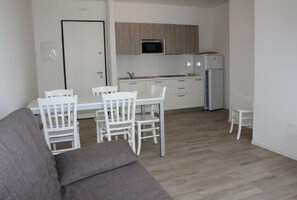 Living area - Residence Giardino three-room apartment Trilo for 7 people (Bibione)