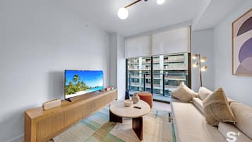 Appart'hôtel, balcon, vue ville | Coin séjour