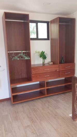 Family Quadruple Room, Pool View | Wardrobe