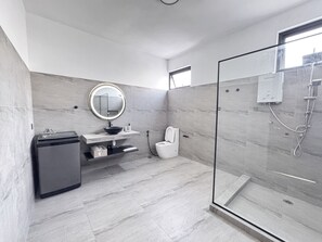 Shower, towels, soap, toilet paper