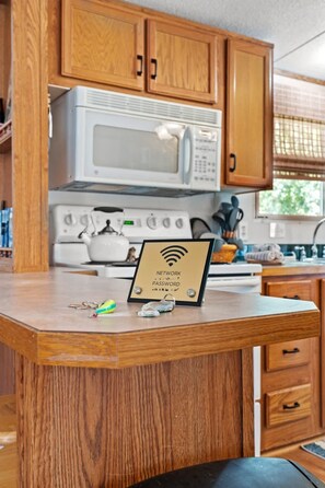 Fridge, microwave, oven, stovetop - River Shack Retreat | Waterfront Cabin | Kayaks Included (McDaniels)