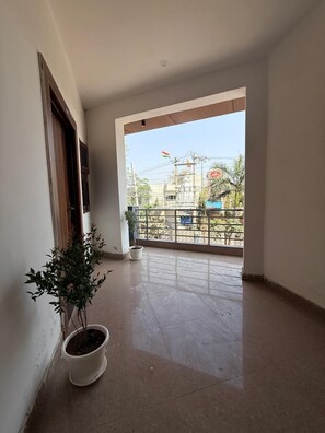 In-room safe, desk, laptop workspace, blackout curtains - Sky Hotel (Gurugram)