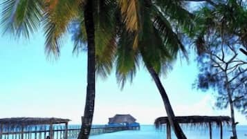 Private beach, white sand, beach umbrellas, beach towels