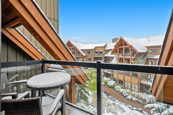 Step out to the balcony and take in snowy views.