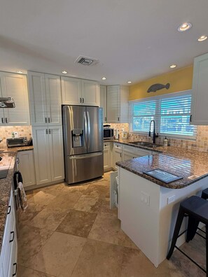 Unclassified image, 5 of 18, button - Waterfront + 2Bed + No Bridge Gulf Access + Dock + Beaches + Pool coming soon! (Englewood)