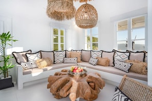 TV, fireplace, books, stereo - SWINGING SUNSET Villa 3BD Sea View w/ Pool& HotTub (Santorini)