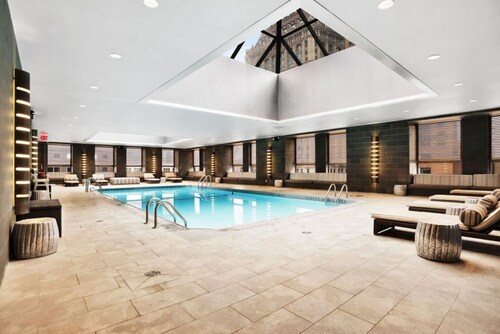 Spacious 1BR at Rector Place – Indoor Pool Retreat