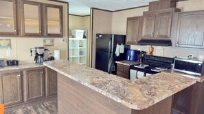 Unclassified image, 3 of 12, button - Cozy 3-bedroom mobile home in serene Winter Haven with AC (Winter Haven)