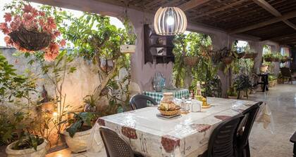 Casa com Ar, Lareira e Churrasqueira no Centro