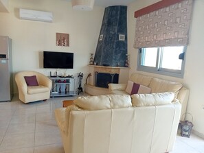 TV, fireplace - Bellavista House in Monolithos Rhodes (Monolithos)