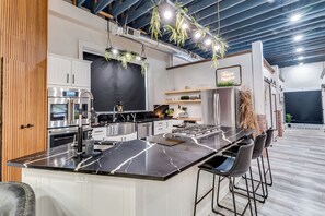 Fridge, microwave, oven, stovetop - Loft N' Loaded: Downtown Wichita Luxury Loft (Wichita)
