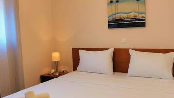 Iron/ironing board, travel crib, free WiFi, bed sheets