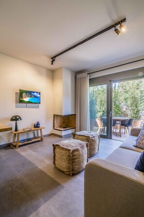 TV, fireplace - One-Bedroom Suite Garden View (Nikiana)