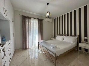 1 habitación, tabla de planchar con plancha, wifi gratis y ropa de cama 