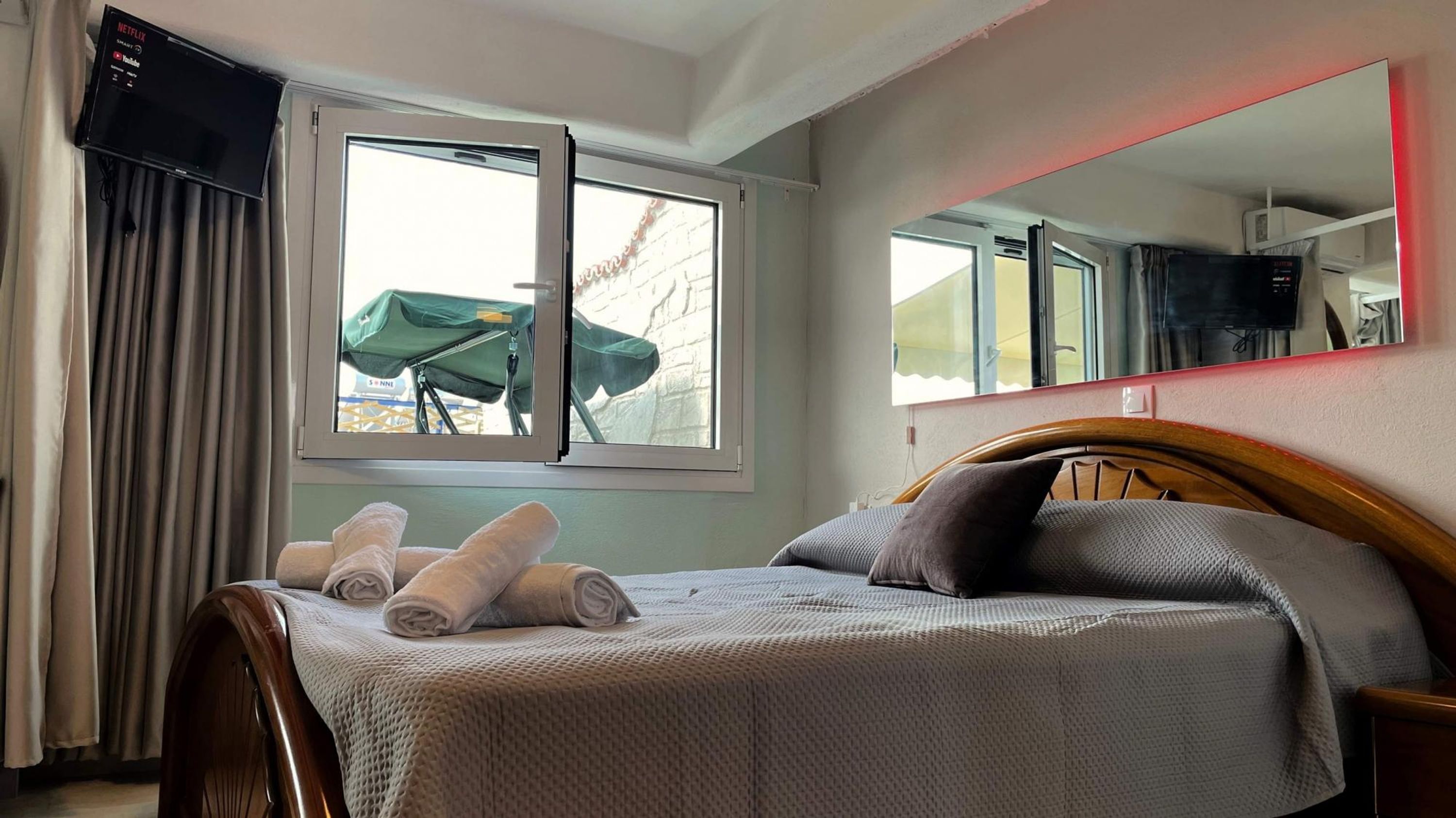 1 bedroom, desk, iron/ironing board, travel crib