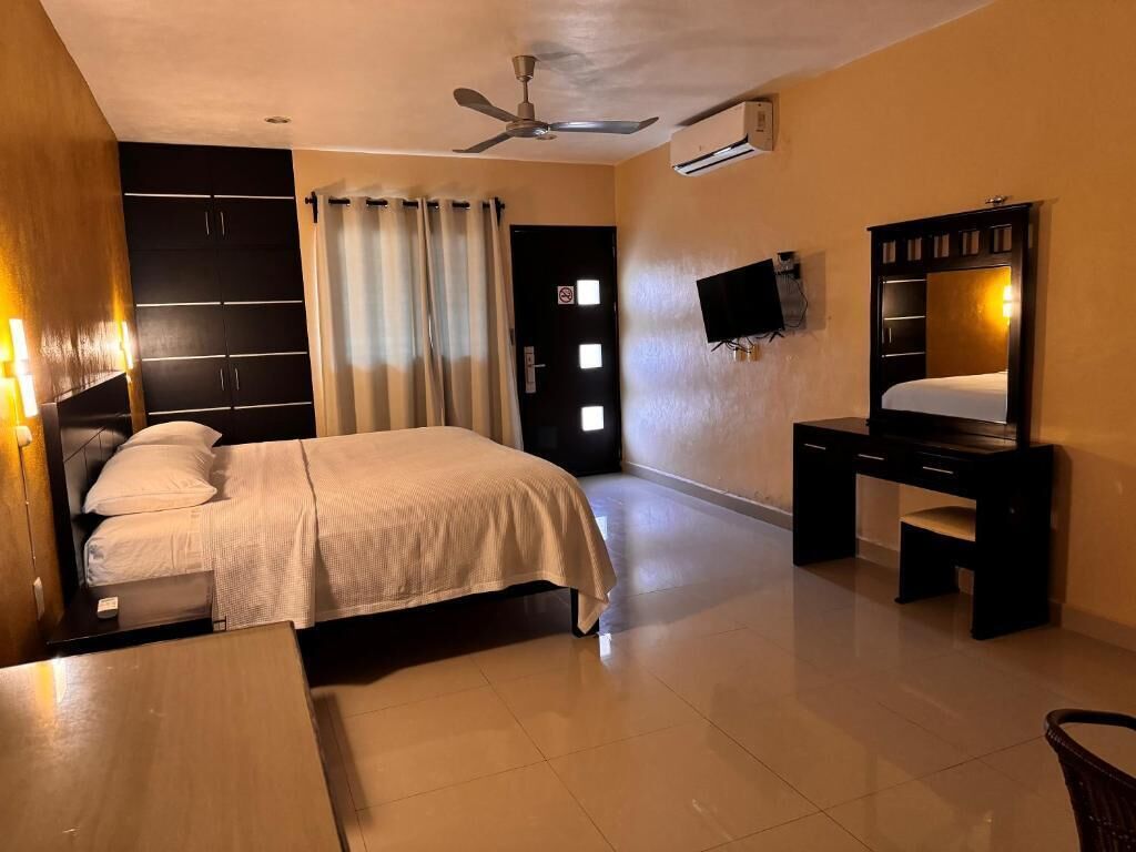 Quarto standard, 1 cama King | Wi-Fi de cortesia