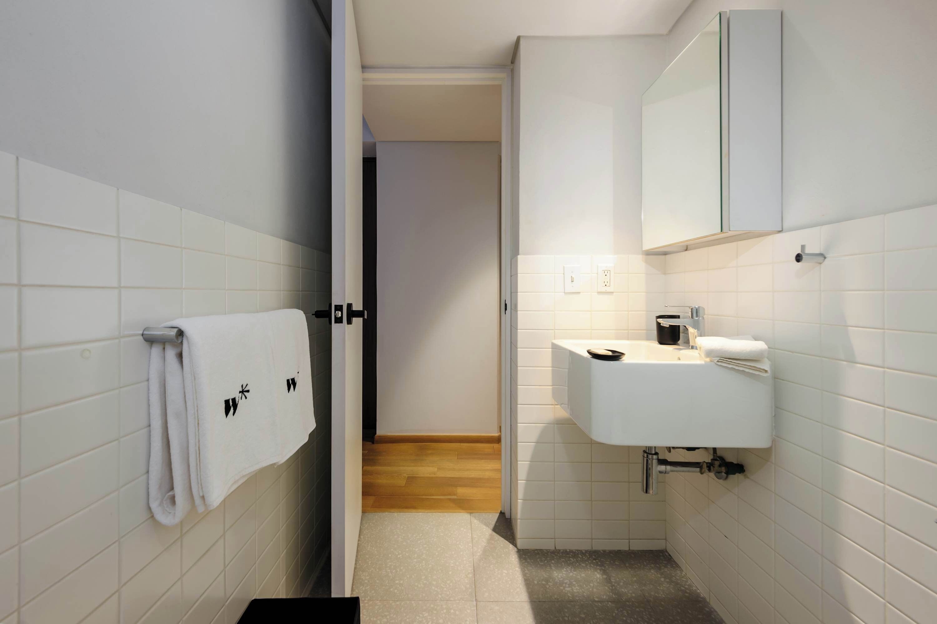 Shower, hair dryer, towels, shampoo