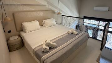 1 bedroom, desk, iron/ironing board, travel crib