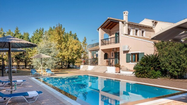 A two-story villa with a swimming pool, outdoor seating, and a garden. - Villa Lefki Limni Retreat 300m from beach (Corfu)