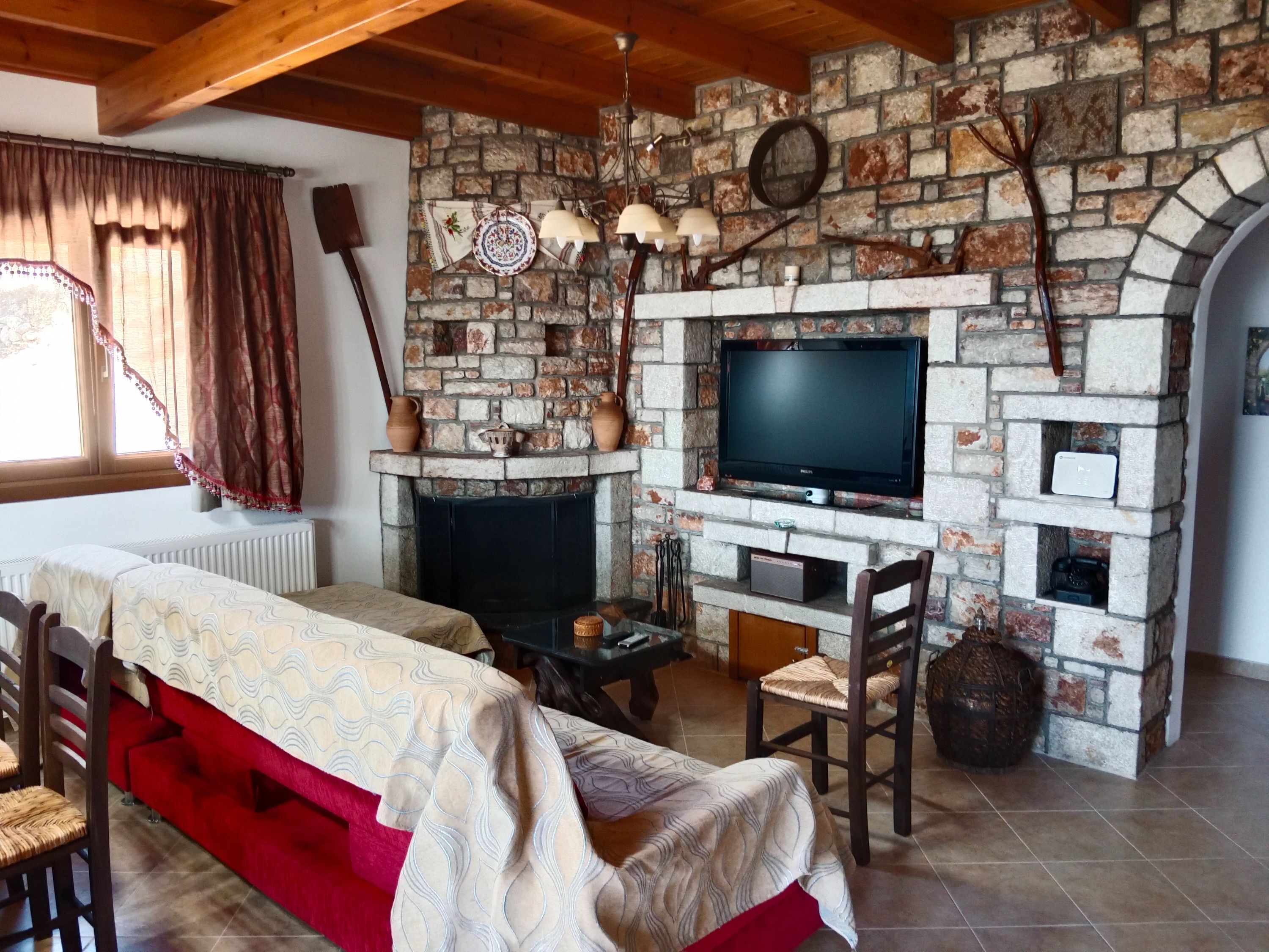 TV, fireplace, books, offices