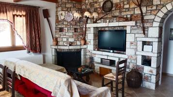 TV, fireplace, books, offices