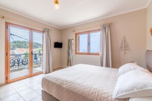 1 habitación, tabla de planchar con plancha y cuna de viaje 
