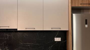Fridge, oven, coffee/tea maker, toaster